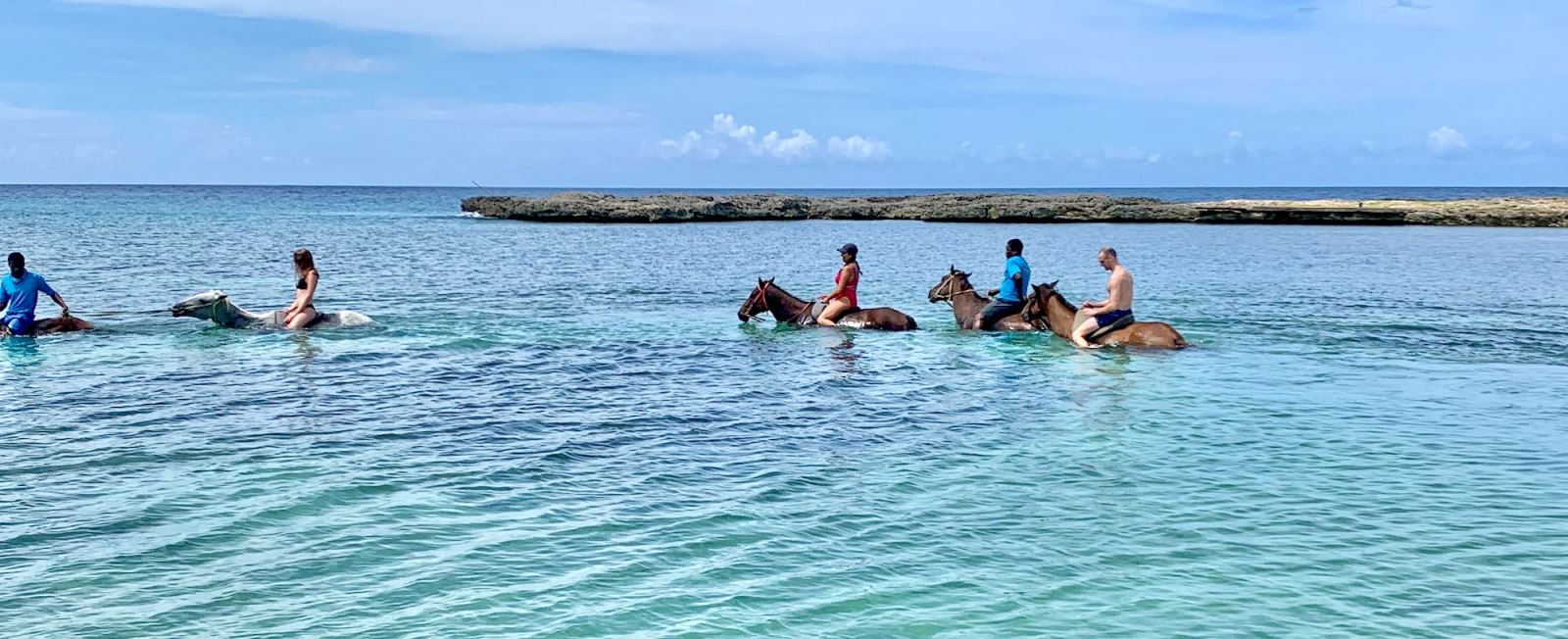 group of riders in the Caribbean sea