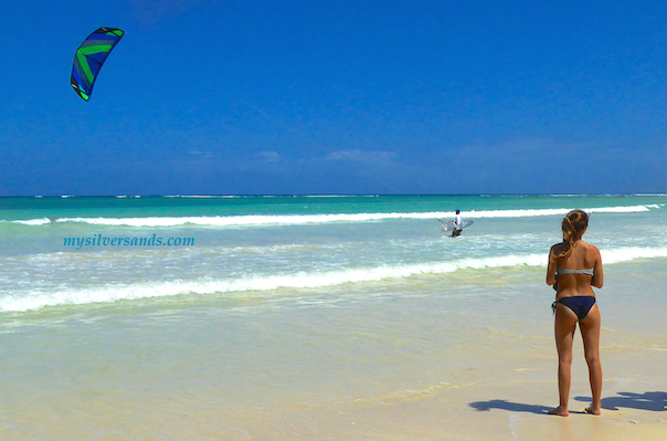 girl viewing kitesurfer