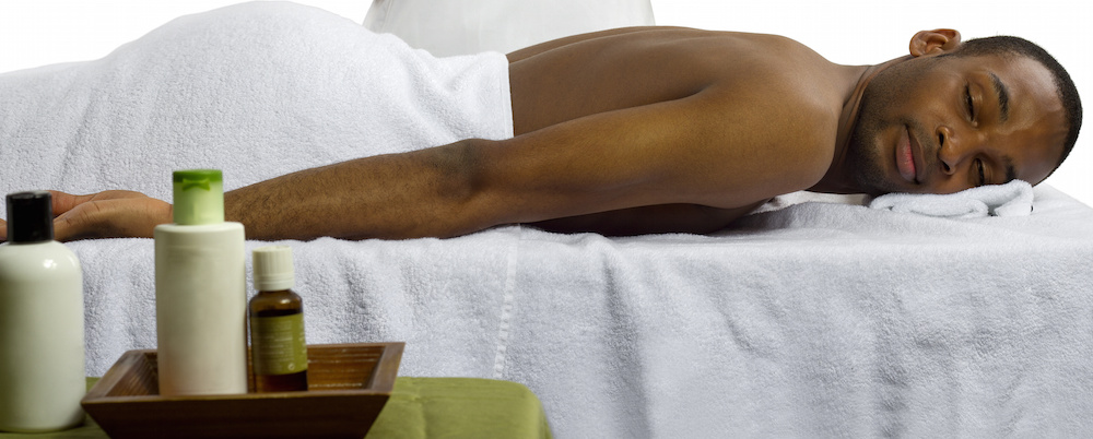 man lying on stomach for massage