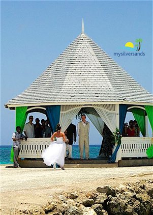 bride walking to gazebo