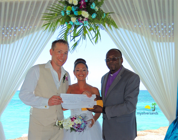 bride and groom with marriage officer