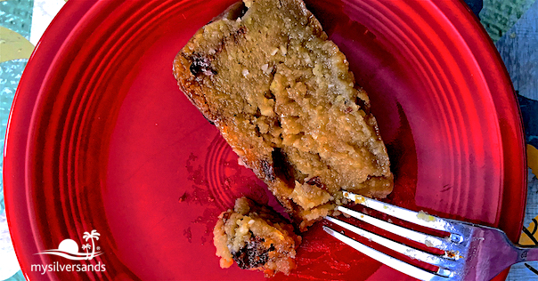 a slice of sweet potato pudding on a plate