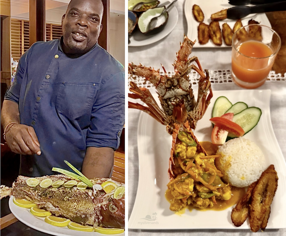 Villa cook serving dinner to a guest at the table; Curried lobster with rice and plantain, plated