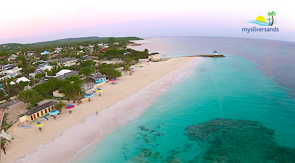 lynn walking along silver sands beach