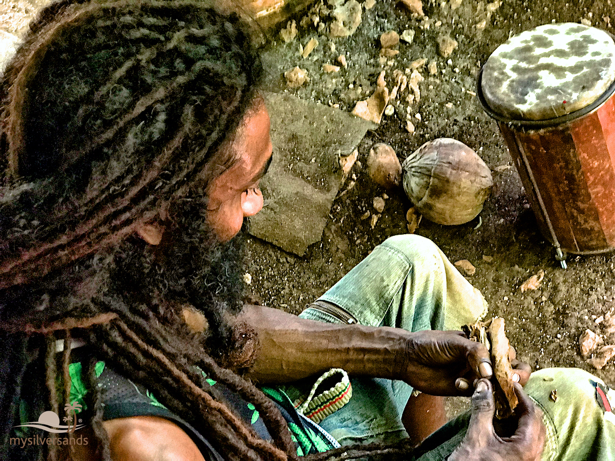 ezekiel rolling a tobacco cigar