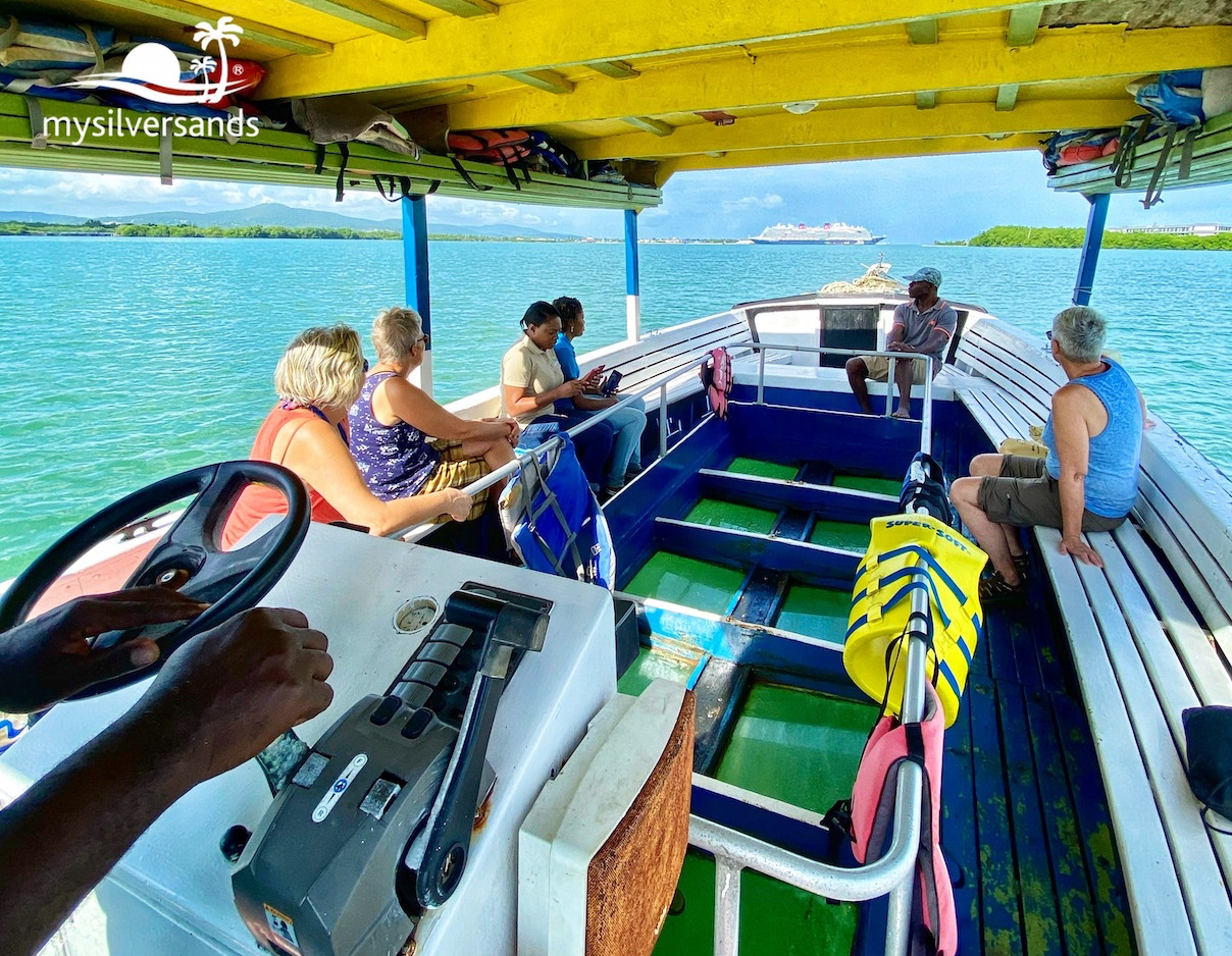 glass-bottom boat cruising out to sea