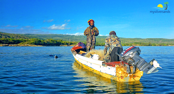 rasta ezekiel and another fisherman in boat