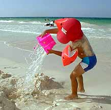 pouring buckets of water in his pool