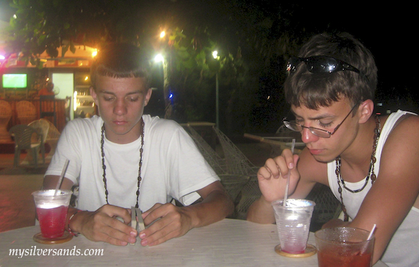 watkins teenagers on the silver sands patio at night