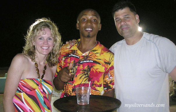 watkins party on the patio with sheldon from the bar at silver sands villas jamaica