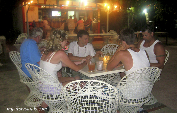 on the silver sands patio at night