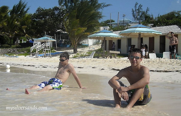 watkins teenagers sitting on the silver sands beach in Jamaica