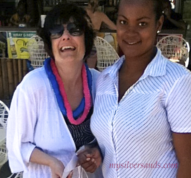 davia with female guest prize winner at bob marley celebration 2011