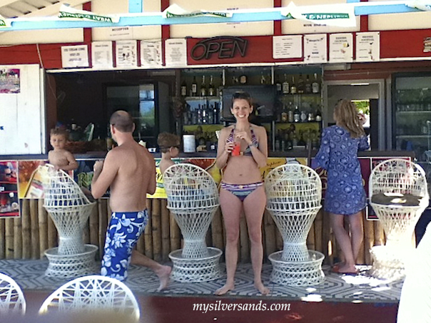 guests at the patio bar at silver sands villas jamaica
