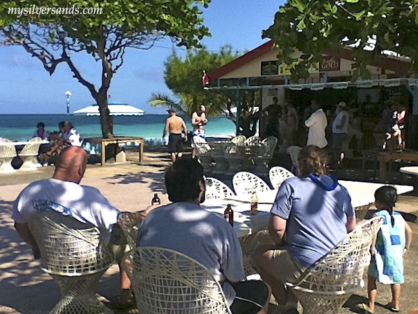 guests on the patio at silver sands jamaica for bob marley quiz