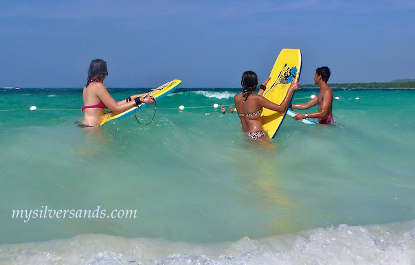 waiting for the wave when bodyboarding on jamaica villas vacations