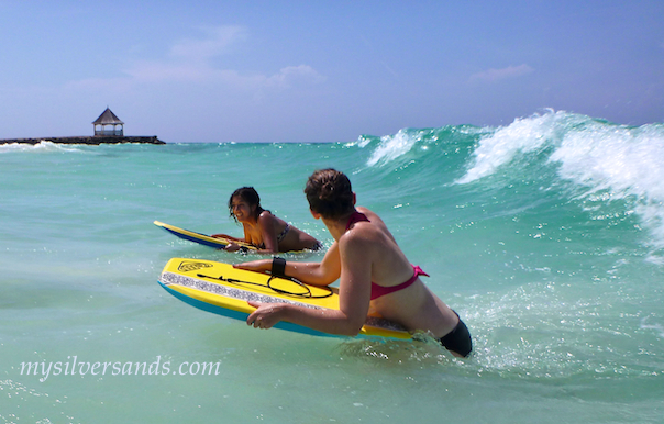 bodyboarding at silver sands villas while on jamaica vacation