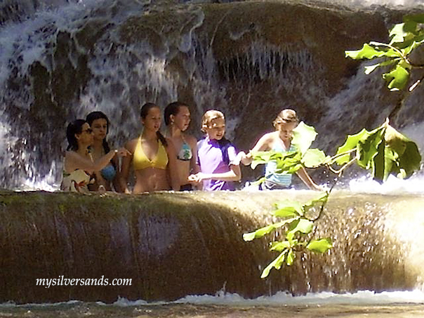 family in pool at dunns river falls jamaica