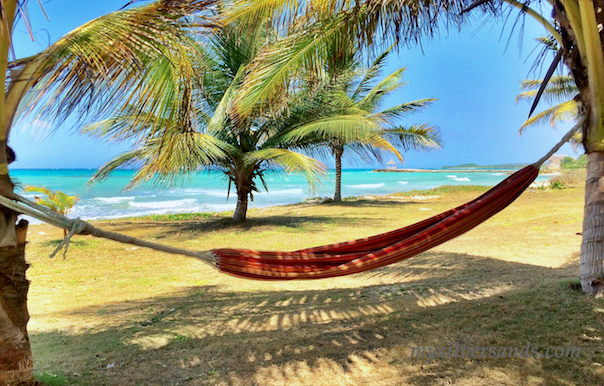 enjoy a hammock, swaying in the breeze on the beachfront at Enless Summer.