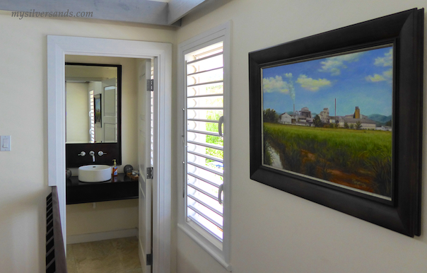 entrance to powder room at top of stairs
