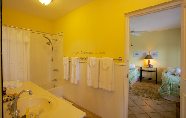 at rock hill villa bedrooms 3 and 4 share a bathroom located between them.