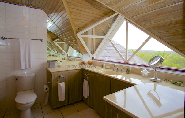en suite bathroom of rock hill villa with large window and sea view