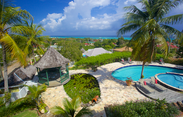 pool area of rock hill villa showing the lily pond and gazebo and the two pools