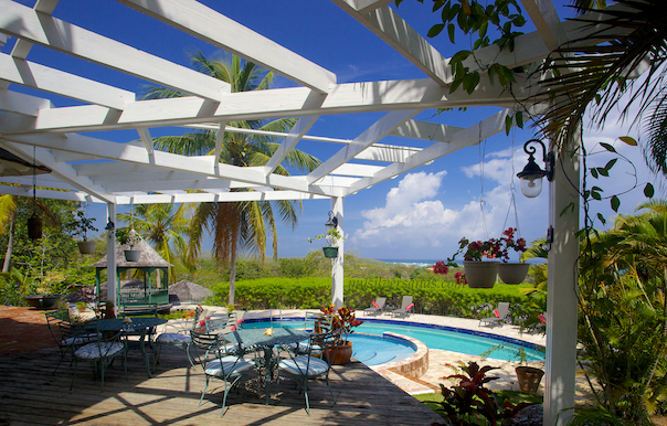 poolside timber deck off bedroom five at rock hill villa