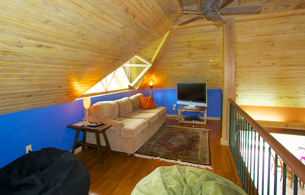 corridor leads to television lounge in the master bedroom suite at rock hill