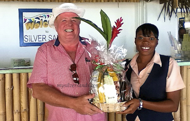 karl eibensteiner welcomed by tanesha, mysilversands rep, with a gift