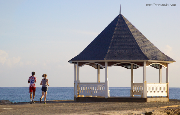 two runners on the jetty at silver sands villas near the gazebo