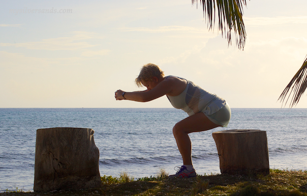 squats using a log or tree stump