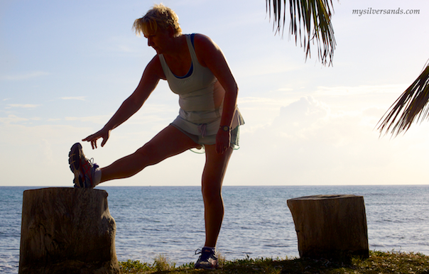 stretching on a tree trunk