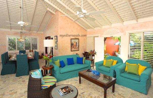 dining and living areas in the spacious and beautifully furnished summertime villa in silver sands jamaica