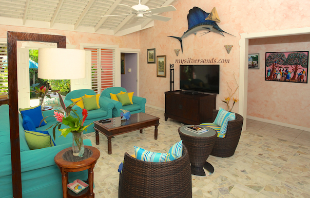 the living room at summertime vill in silver sands jamaica showing the widescreen television.